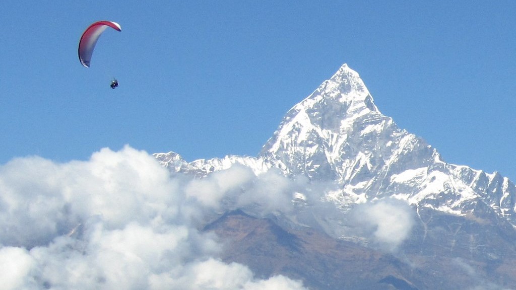 paragliding over the majestic Himalayan mountains